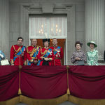 The Queen, played by Olivia Colman, is joined by the rest of the royal family (various cast) on the balcony of Buckingham Palace for the Trooping of the Colour scene